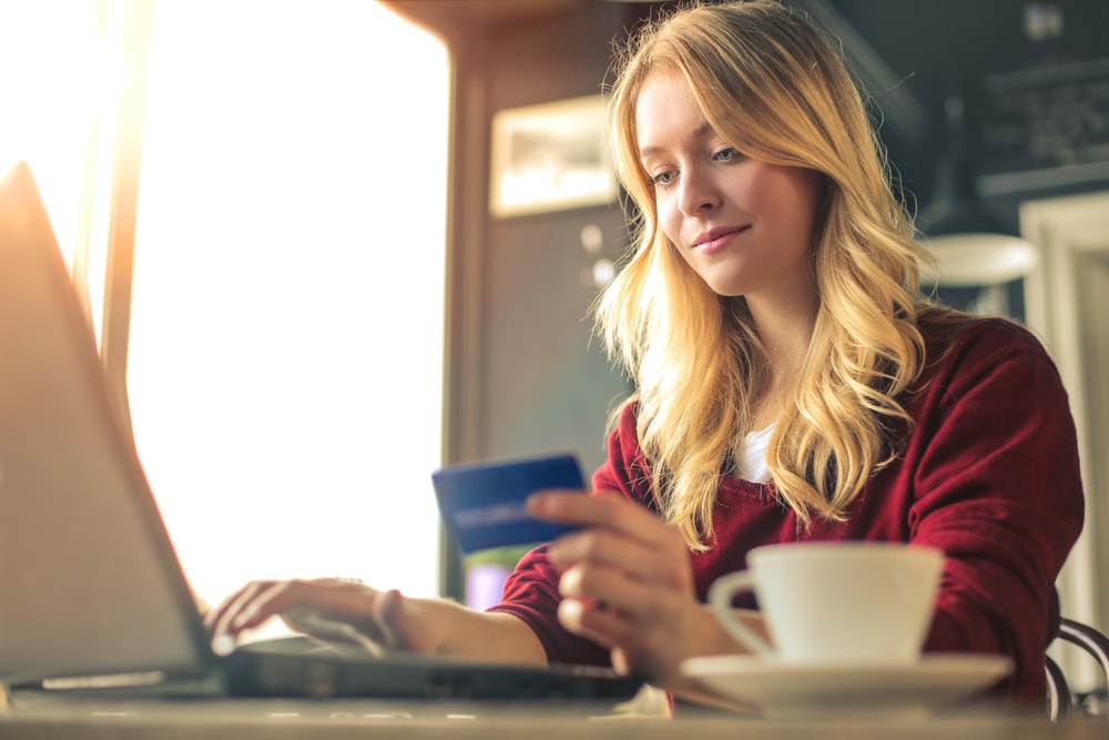 women paying online with credit card